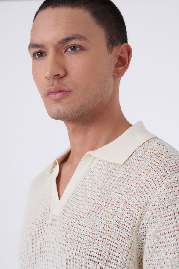 Polo traforata con collo bowling