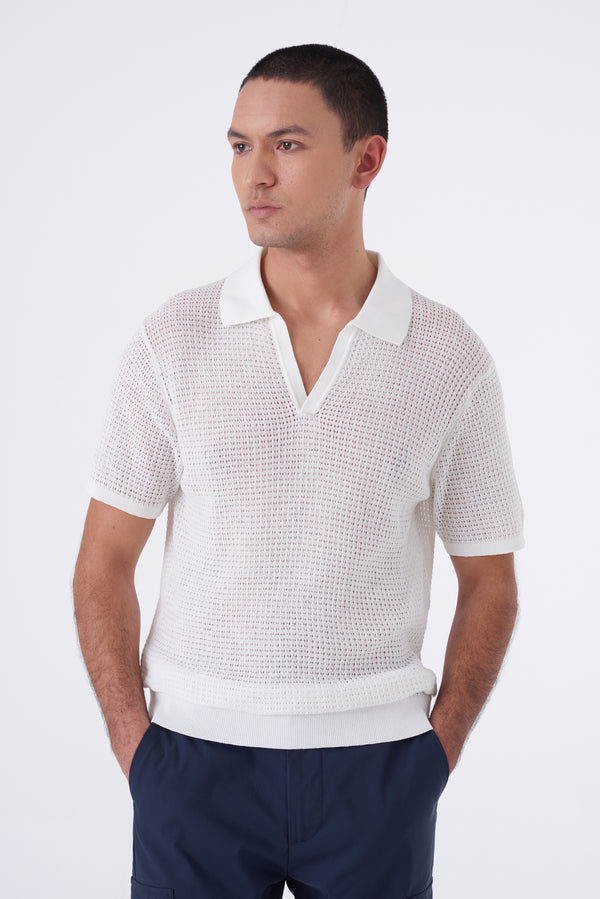 Polo traforata con collo bowling