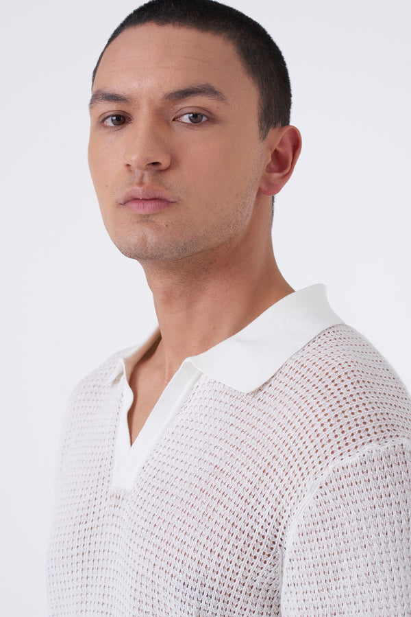 Polo traforata con collo bowling