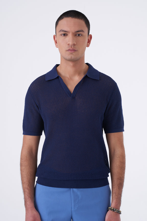 Polo traforata con collo bowling