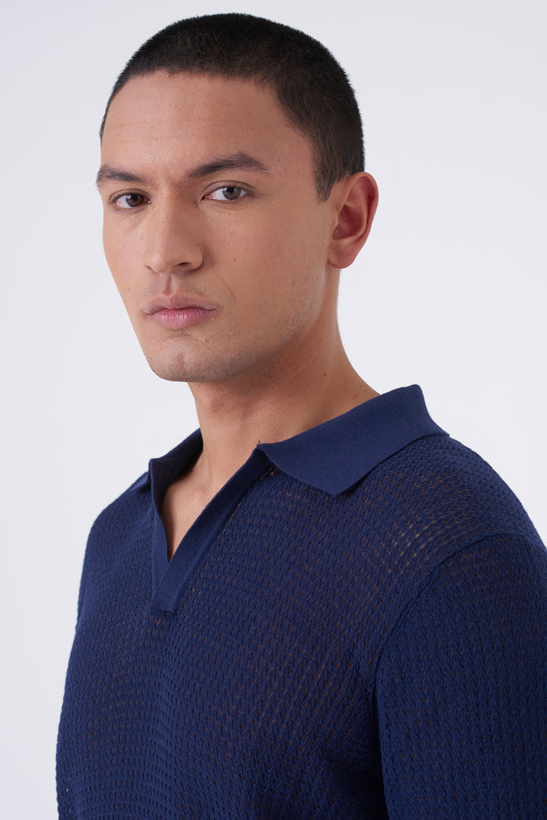 Polo traforata con collo bowling