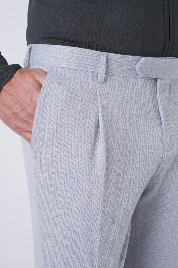 Trousers with woven pattern