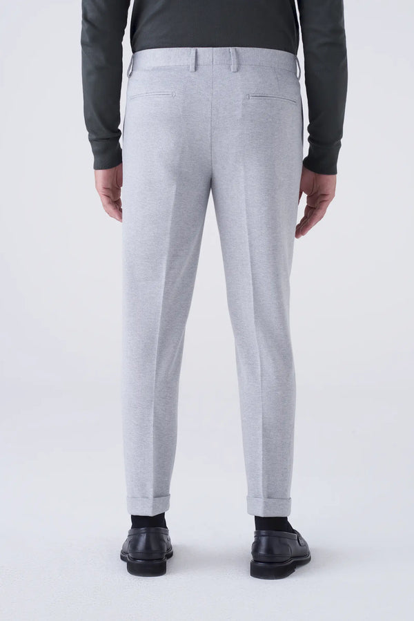 Trousers with woven pattern