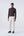 High-waisted trousers and long faux fur