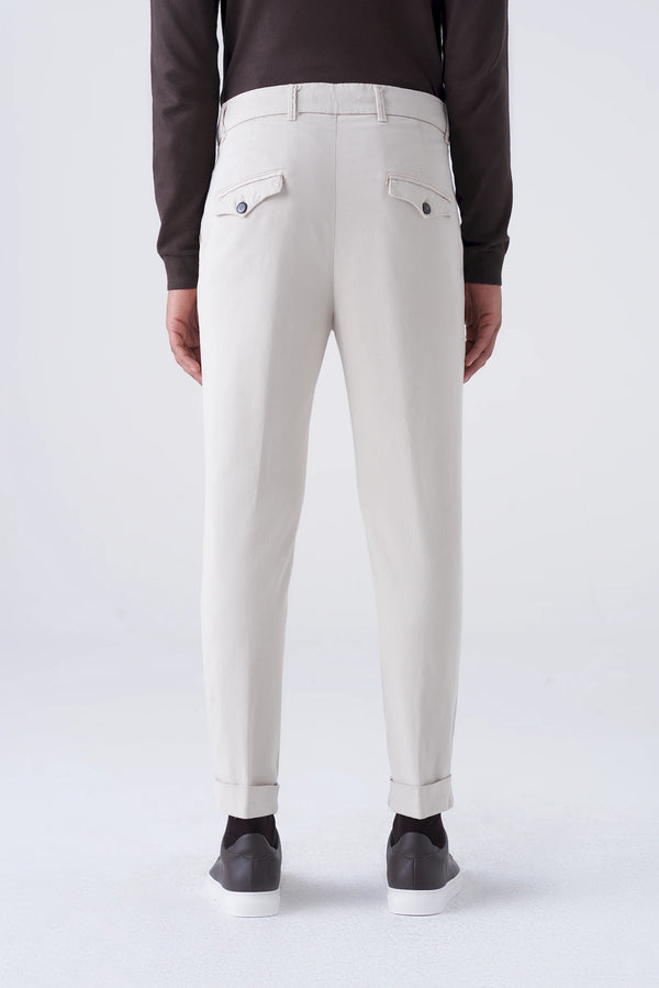 High-waisted trousers and long faux fur
