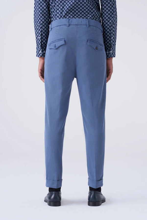 High-waisted trousers and long faux fur