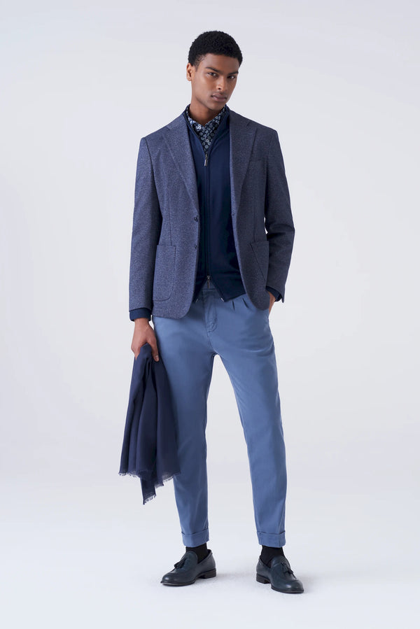 High-waisted trousers and long faux fur