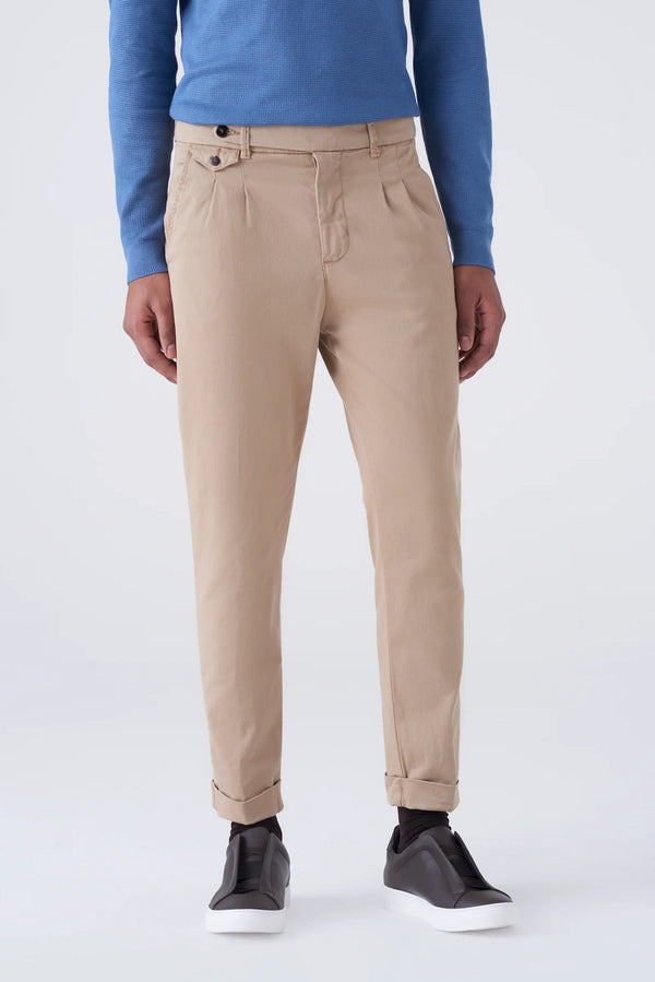 High-waisted trousers and long faux fur