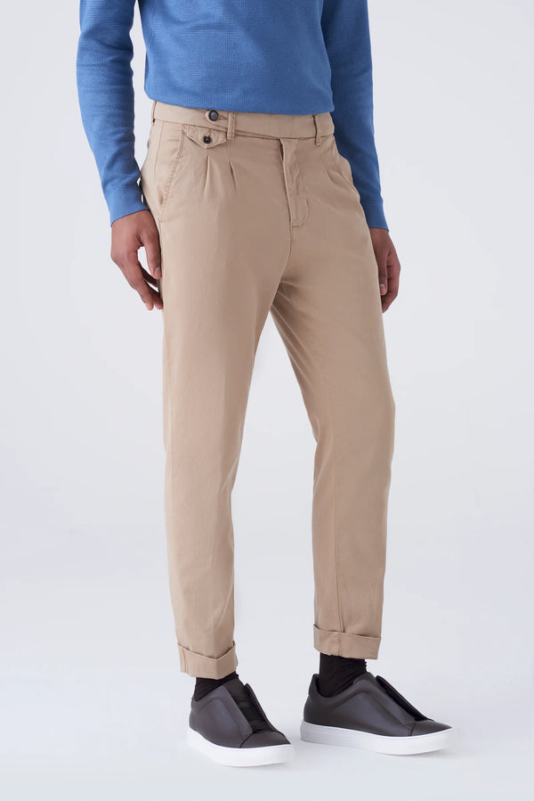 High-waisted trousers and long faux fur