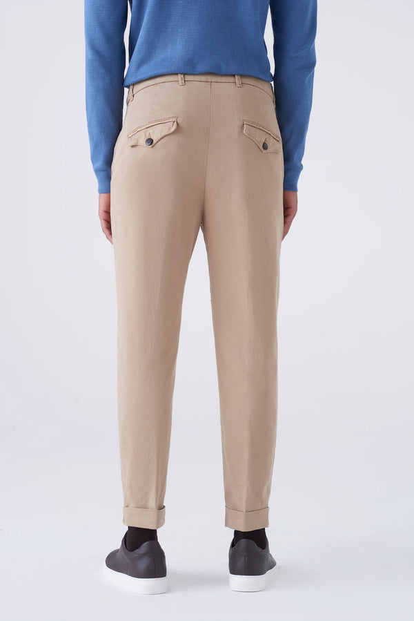 High-waisted trousers and long faux fur